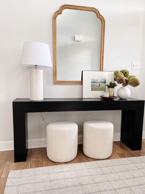 Entryway Console With Ottoman, Ottoman Entryway Ideas, Entryway Ottoman Ideas, Entry Table With Ottomans Under, Ottoman Bench Decor, Ottoman Under Console, Ubud Console, Black Console Table Entryway, Mid Century Entryway Ideas