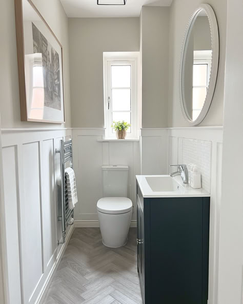 Using light colours in a cloakroom bathroom will help the space feel bigger, and we're loving this wall panelling to give this bathroom a classic charm ✨  📷: the_haddon_home Oak Lvt Flooring, Small Toilet Ideas, Down Stairs Toilet, Downstairs Toilet Ideas, Cloakroom Ideas, Restoration House, Small Downstairs Toilet, Cloakroom Toilet, Downstairs Wc