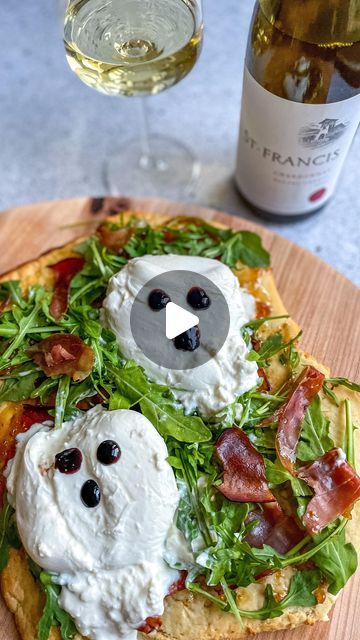 Emily Love Leserman on Instagram: "🍕 👻 BOO-Rata Flatbread 👻🍕

This fig, prosciutto, arugula flatbread is perfectly topped by deliciously, spooky BOO-Rata! And it’s perfectly paired with a beautiful glass of @stfranciswinery Chardonnay #stfrancispartner 
 
The balance of fruit and vanilla in this beautiful chardonnay pairs well with the rich texture of burrata. And the thing that makes this flatbread so good is that every part of your palate is hit!
 
The prosciutto adds saltiness, the fig preserves add sweetness, the balsamic reduction gives it some bite, and the peppery arugula rounds out the dish.
 
HOW TO MAKE:
🍕 preheat the oven to 450 and roll out some pizza dough. I use a pre-made gluten free dough
🍕 place on a pizza stone or baking sheet and top with fig preserves
🍕 place pro Arugula Flatbread, Fig Prosciutto, Fig Preserves, Gluten Free Dough, Balsamic Reduction, Fall Entertaining, Pizza Stone, A Pizza, Pizza Dough