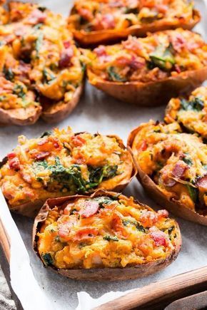 These twice baked sweet potatoes can be served as a healthy meal or side dish - your choice! They're packed with a savory mixture of caramelized onions, spinach and bacon and baked to perfection. They're family approved, Paleo, Whole30 compliant, and dairy-free. Paleo Running Momma, Spinach And Bacon, Twice Baked Sweet Potatoes, Sweet Potato Skins, Baked Sweet Potatoes, Paleo Diet Recipes, Twice Baked, Recipe 30, Baked Sweet Potato