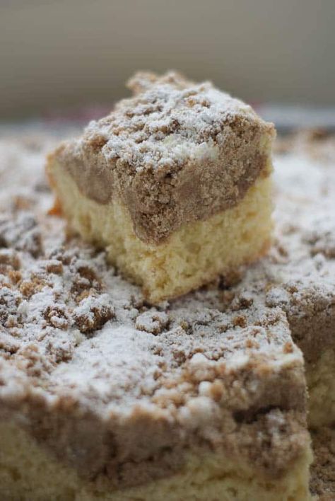 Slice of homemade German Crumb Cake on top of the rest of the cake. German Crumb Cake Recipe, Cake Boss Recipes, Crumb Coffee Cakes, Coffee Cake Recipes Easy, Crumb Cake Recipe, German Desserts, German Baking, Boss Style, Coffee Cake Muffins