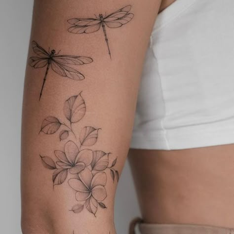 Asya • Floral tattoo on Instagram: "Floral sleeve with frangipani, magnolia, sunflowers and dragonflies for Stéphanie 🤍 She gave me total freedom in creating this sleeve, just described the flowers she would like to have. I’m so thankful for such trust, so in love with this project!" Flower Dragonfly Tattoo, Floral Dragonfly Tattoo Design, Dragonfly And Floral Tattoo, Dragonfly Tattoo Sleeve, Dragonfly Arm Tattoos For Women, Floral Dragonfly Tattoo, Dragonfly Flower Tattoo, Butterfly Dragonfly Flower Tattoo, Floral Dragonfly Tattoo Sleeve