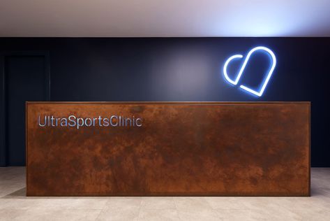 https://flic.kr/p/2hq24Zg | Ultra Sports Reception Desk in Aged Copper | Aged Copper Desk Neon Reception Desk, Copper Reception Desk, Metal Reception Desk, Steel Reception Desk, Copper Office, Hotel Bar Design, Clinic Reception, Squash Court, Copper Desk