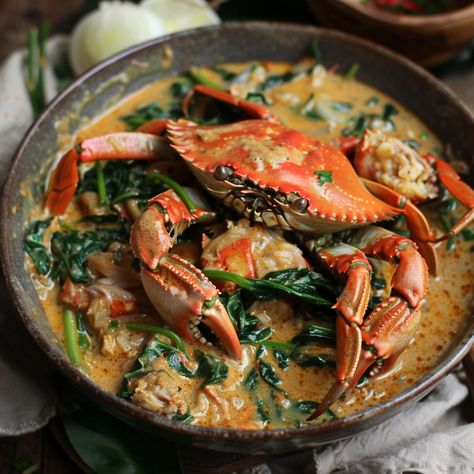 🦀 Indulge in the creamy, savory taste of Ginataang Alimango! A delightful Filipino seafood treat! 🥥🍛 #CrabLovers #CoconutMilk Ginataang Alimango (Crab in Coconut Milk) Ingredients: Fresh crabs (4, cleaned) Coconut milk (2 cups) Coconut cream (1 cup) Garlic (4 cloves, minced) Onion (1, chopped) Ginger (1 thumb-sized piece, sliced) Green chilies (2, sliced) Fish sauce (2 tbsp) Spinach or kangkong (1 bunch) Cooking oil (2 tbsp) Instructions: In a pan, sauté garlic, onion, and ginger in oil u... Filipino Seafood Recipes, Ginataang Alimango, Filipino Seafood, Instagram Recipes, Slices Recipes, Trending Recipes, Minced Onion, 2025 Vision, Green Chilies