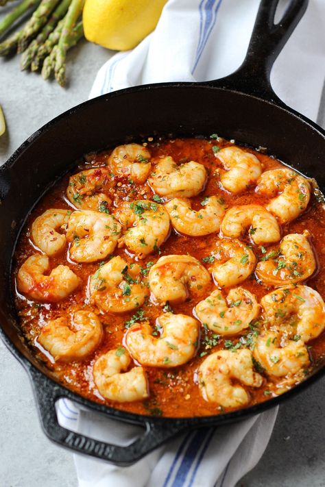 20-minute Portuguese Shrimp Mozambique cooked in a spicy garlic butter sauce and served over a bed of white rice! #shrimpmozambique #portugueseshrimp #shrimp #seafood #seafoodstew Spicy Garlic Butter Sauce, Portuguese Shrimp, Shrimp Mozambique, Shrimp Stew, Seafood Stew, Garlic Butter Sauce, Shrimp Dishes, Portuguese Recipes, How To Cook Shrimp