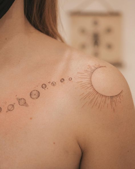 Celestial Ink: 30 Creative Solar System Tattoo Ideas You’ll Love 9 Solar System Geometric Tattoo, Planet Orbit Tattoo, Small Solar System Tattoo, Fine Line Space Tattoo, Celestial Tattoos For Women, Small Space Tattoo Ideas, Solar System Spine Tattoo, Minimalist Space Tattoo, Space Theme Tattoo