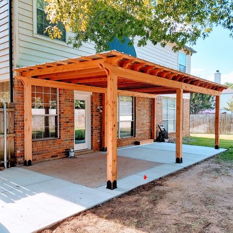 All cedar pergola with metal roof. Built in North Richland Hills, Texas. Girard Contracting and Construction Post And Beam Patio Cover, Covered Wood Patio, Free Standing Porch Roof, Mobile Home Pergola, Pergola With Slanted Roof, Attached Pergola With Roof, Metal Roof On Pergola, Outside Roof Patio, Wooden Patio Covers