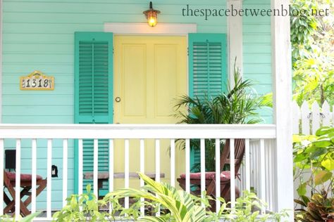 front door colors and using Key West front doors for inspiration - the space between Exterior House Colors Florida, Key West House Colors, Teal Shutters, Key West Colors, Exterior Beach House, Turquoise House, Key West Style Homes, Key West House, Paint Colors For House