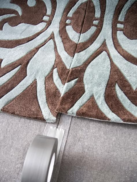 How to Make One Large Custom Area Rug from Several Small Ones : Decorating : Home & Garden Television 2 Rugs Together, Carpet Tiles As Area Rug, How To Sew Two Rugs Together, Diy Large Area Rug, Multiple Area Rugs In One Room, Rug Patterns Design, Multiple Rugs In One Room, Diy Area Rug, Area Rugs Diy