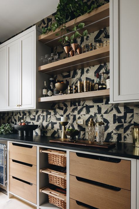 Geometric square pattern with brushstrokes of black on beige create a modern look that anchors floating shelves and acts as a backsplash to this butler's pantry. Striking Wallpaper, What Is Design, Rainbow Road, Construction Waste, Historic Renovation, Geothermal Energy, Dry Bar, Butler's Pantry, Historic Preservation