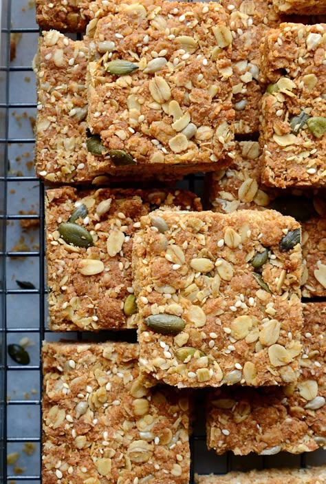 Best healthy seeded oat crunchies | A Bibbyskitchen recipe Oat Slices Recipes Easy, Healthy Slice Recipe, Healthy Oat Bars, Healthy Biscuits Recipe, Healthy Baked Snacks, Crunchie Recipes, Oat Slice, Healthy Slice, Tray Bake Recipes