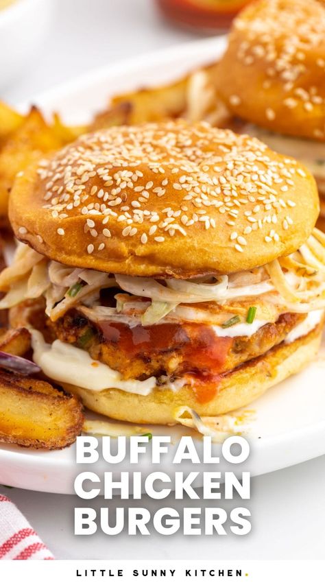 Everyone will love this Spicy Buffalo Chicken Burger served on a buttery and sweet brioche bun with creamy, crunchy ranch cabbage slaw. Poblano Chicken, Buffalo Chicken Burgers, Buffalo Burgers, Ground Chicken Burgers, Homemade Slaw, Hot Wing Sauces, Spicy Buffalo Chicken, Chicken Burgers Recipe, Homemade Buffalo Sauce