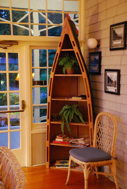 Canoe bookshelf by afagen, via Flickr Canoe Bookcase, Canoe Bookshelf, Canoe Shelves, Canoe Shelf, Boat Bookcase, Cheap Dresser, Log Home Kitchens, Lake Crescent, Rustic Decorating