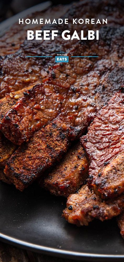 Grilled Beef Galbi (Korean-Style Marinated Short Ribs) | The short ribs are marinated in a soy sauce-based mixture that gets an allium punch from garlic, onion, and scallions, and is sweetened with brown sugar and Asian pear. Black pepper and toasted sesame oil balance out the marinade's sweet and savory notes. The short ribs are quickly grilled over high heat, and then served with Korean garnishes. #korean #galbi #kbbq Korean Galbi Marinade, Beef Short Ribs Recipe Grilled, Korean Kalbi Marinade Recipe, Galbi Marinade, Best Korean Short Ribs Recipe, Korean Toast, Korean Short Rib Marinade, Marinated Short Ribs, Korean Galbi