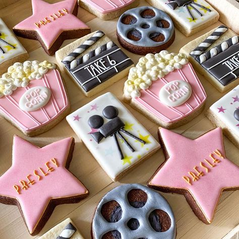 Movie Party Cookies, Movie Theme Birthday Party Food, Movie Night Cookies Decorated, Pink Movie Night Birthday Party, Pink Movie Party, Pink Movie Night Party, Pink Hollywood Theme Party, Movie Night Birthday Cake, Movie Theater Birthday Party Ideas