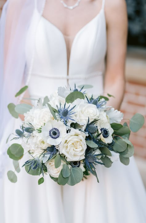 White Rose And Blue Flower Bouquet, White With Blue Bridal Bouquet, Blue Thistle Bridal Bouquet, Dusty Blue And Navy Bridal Bouquet, Blue And Grey Bouquet, White Anemone Bridal Bouquet, Bridal Bouquet With Blue Flowers, Dusty Blue White And Greenery Bouquet, White Roses And Anemones