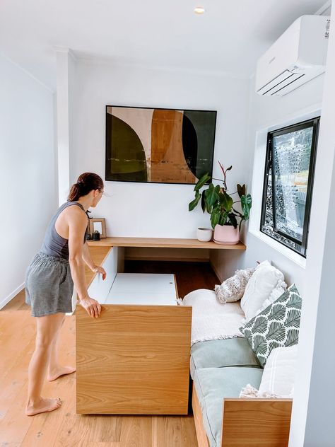 This Tiny House has Two Pull-Out Couches That Transform Into a Bed Bed On Wheels, Storage Couch, Pull Out Storage, Tiny House Storage, Engineered Oak Flooring, Tiny House Nation, Pull Out Couch, Unique Beds, Tiny House Interior