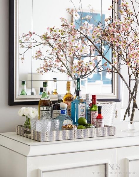 Now don’t get me wrong – I love a good bar cart setup. In fact, I had one in my last apartment. They’re a practical, functional solution to a small space and they’re pretty … Bar Tray Styling, Sophisticated Apartment, Console Decor, Bandeja Bar, Bar Sala, Gold Bar Cart, Home Bar Design, Bar Tray, Bar Inspiration