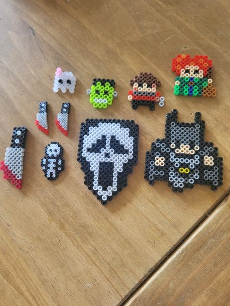 Various halloween 🎃 hema beads, can use for earrings, necklace  costumes, home decor, crafts. Jackolantern Perler Beads, Things To Make Halloween, Peeler Beads Patterns Halloween, Tiny Hama Bead Designs, Halloween Melting Beads, Ghost Face Perler Bead Pattern, Perler Bead Art Halloween, Hama Bead Halloween, Perler Beads Ideas Halloween