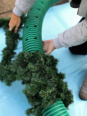 How to Make an Oversized Christmas Wreath | HGTV Oversized Christmas Wreath, Christmas Wreath Designs, Outdoor Christmas Wreaths, Large Christmas Wreath, Front Porch Christmas Decor Ideas, Porch Christmas Decor Ideas, Porch Christmas Decor, Front Porch Christmas, Christmas Decor Ideas Diy