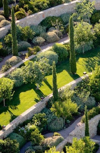 Terraced Mediterranean Garden, Terraced Slope Landscaping, Mediterranean Planting Scheme, Cypress Trees Landscape, Terraced Slope, Mediterranean Trees, Mediterranean Garden Ideas, Layered Garden, Mediterranean Landscape Design