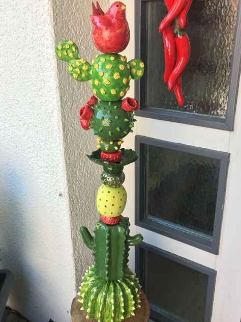 my handmade ceramic cactus totem | Totem pole art, Garden ... #handmadeceramics #ceramic Pottery Totem, Ceramic Totems, Ceramic Unique, Totem Pole Art, Diy Totem, Ceramic Cactus, Outdoor Pottery, Cactus Ceramic, Garden Totem