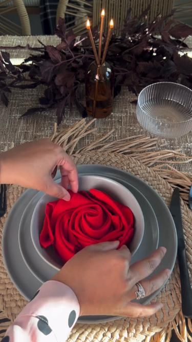 Valentine tablescape napkin folding inspiration for you! ♥️💖🤍 credits to: @swes_decornmore How To Make Dinner Table Look Fancy, Red Roses Birthday Decorations, Tablescapes Valentines Day, At Home Valentines Dinner Decor, Date Table Set Up Romantic, Red And Cream Table Setting, Dinner Set Up Table Ideas At Home, Red Rose Dinner Table, Valentine’s Day Home Dinner Decor