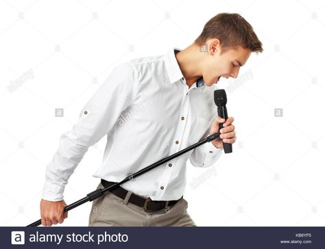 Young man singing into a microphone isolated on white background Stock Photo Microphone Drawing, Man Singing, Singing Microphone, People Poses, White Background Photo, Body Poses, Pose Reference Photo, Art Poses, Drawing Reference Poses