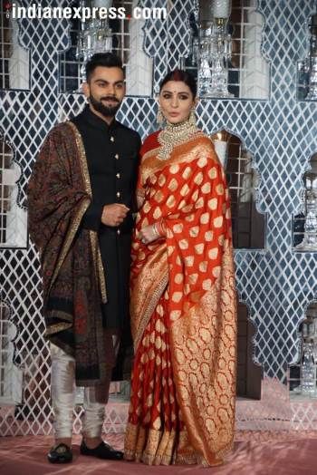 Best photos from Anushka Sharma and Virat Kohli’s Delhi wedding reception | Entertainment Gallery News - The Indian Express Wedding Matching Outfits, Virat And Anushka, Wedding Dresses Men Indian, Reception Outfit, Banarsi Saree, Designer Silk Sarees, Indian Bride And Groom, Bollywood Wedding, Indian Bridal Outfits