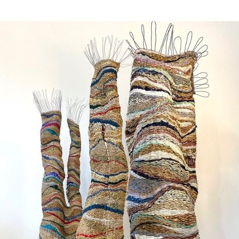 Textile Curator on Instagram: "Day 6 of 100 Days of Amazing Textile Art is textile sculpture by British artist Lizzie Hill @lizzie_j_hill “I am referencing the earths geology and asking questions about our environmental footprint through woven sculpture from waste materials such as plastic bags, newspaper, old jumpers and the odd crisp packet, I weave my work on handmade wire frames and then sculpt them into large anthropomorphic forms.” Group shot of Polystrata, Majesty and Office Clearout; g Waste Material Project, Woven Sculpture, Crisp Packet, 3d Textiles, Geology Art, Palm Tree Crafts, Wool Sculpture, J Hill, Food Project