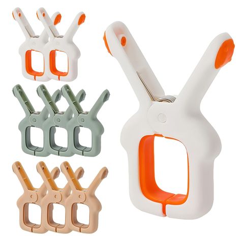 9Pcs Clothes Pins, Beach Towel Clips Towel Holder Clips Windproof Clothes Clips for Hanging Clothes, Quilt, Dolls (Green/Pink/Orange) About the Product Key Features 【Soft Silicone Pad Design】Unlike sharp clips, our soft silicone pad design ensures no marks or damage to clothes while providing excellent non-slip properties, making it perfect for securing garments. 【Versatile Use】This beach towel clip can be used for both holiday and daily life, such as hanging clothes, socks, dolls, laundry clip, bag clip, towel clip, photo clip, food clip and so on. The plastic clothespin is strong enough to hold everything into the right size and won't fall off in windy, rainy and icy weather, so your towels, clothes and blankets won't be blown away. 【Perfect Size】Each clothespin measures 3.5 x 2.5 x 1.5 Icy Weather, Towel Clips, Clothes Clips, Food Clips, Photo Clips, Laundry Supplies, Hanging Clothes, Bag Clips, Windy Day