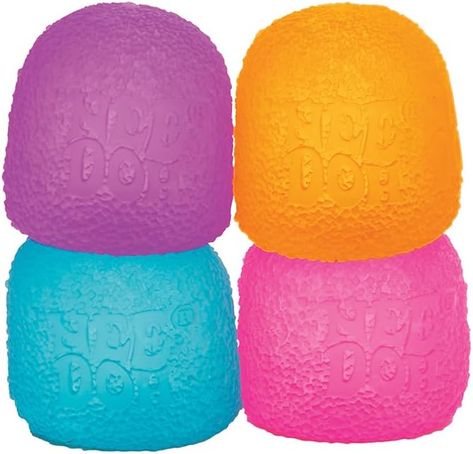 Get ready for the Sweetest Squish experience that comes in 4 assorted candy colors. Each gumdrop has a textured surface, and is filled with a unique super solid squish filling! Squish it fast and it feels hard, squish it slow and it feels super soft. Stretch it out, and it pops back into shape! A fun sensory fidget toy you won't want to put down. Recommended for ages 3 years and older. Contains 1 textured gumdrop Needoh in a variety of bright, neon colors. This Needoh measures 2.4" in width and Nee Doh Gumdrop, Needoh Cube, Nee Doh, Stim Toys, Candy Games, Cool Fidget Toys, Gum Drops, Xmas Presents, Fidget Toy