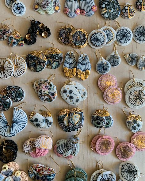 Several rows of hand painted porcelain earrings, in a variety of different colours, and hand painted and organic designs.
Some have a gold lustre finish, and either have a silver or gold plated sterling silver hook. Beads Clay, Ceramic Accessory, Hand Painted Beads, Porcelain Earrings, Handmade Market, Hand Painted Earrings, Painted Earrings, Painted Jewelry, Ceramic Earring