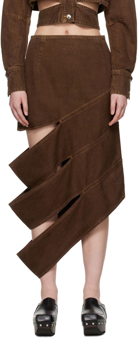 Lightweight overdyed non-stretch denim skirt. Fading, twisted seams, and cutouts throughout. · High-rise · Asymmetric hem · Concealed zip closure at side seam · Logo-engraved silver-tone hardware · Contrast stitching in tan Supplier color: Tobacco Evil Clothes, Structural Fashion, Handkerchief Skirt, Stretch Denim Skirt, Workwear Brands, Eckhaus Latta, Denim Midi Skirt, Asymmetrical Skirt, Modern Fashion