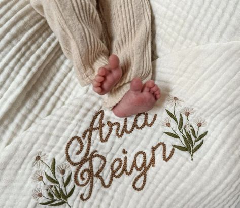 Introducing our personalized embroidered blankets, meticulously crafted for those unforgettable moments in your little one's journey.  Made from luxuriously soft 100% cotton Oeko-Tex certified double gauze fabric, each blanket measures approximately 44" X 44", ensuring a cozy embrace for your bundle of joy. Customization is key with a range of base and flower combinations, name colors, and fonts to choose from. Our blankets are not just blankets; they're personalized heirlooms waiting to be cher Daisy Baby Blanket, Flower Combinations, Embroidered Baby Blanket, Monogrammed Baby Quilt, Gauze Blanket, Baby Receiving Blankets, Embroidered Blanket, Personalized Baby Boy, Boy Blankets