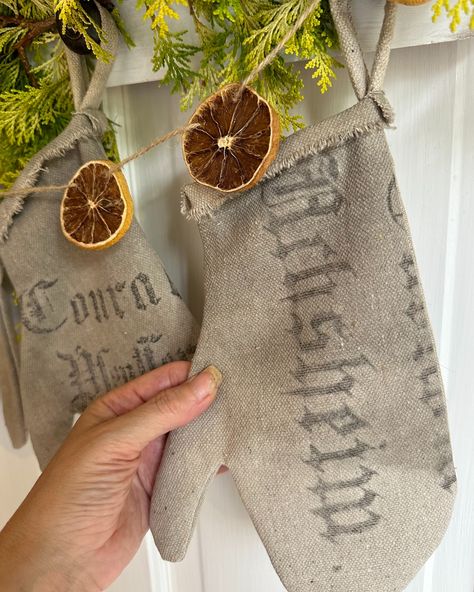 Winter mittens are back in stock! They are a featured Etsy pick and completely sold out last year. Deliciously primitive mittens made from vintage grain sack. The shape and size are copied from my Grandmother's actual mittens! Rustic frayed edges, some serious grunge and fabulous, old style, German text make each mitten unique. https://grayhorsefarm.etsy.com/listing/1282586110 #farmhousestyle #rusticcountry #primitivedecor #farmhousechristmas #grayhorsefarm #oldfashionedchristmas Primitive Mittens, German Text, Christmas Booth, Vintage Grain Sack, Winter Mittens, Grey Horse, Grain Sack, Booth Display, Old Fashioned Christmas