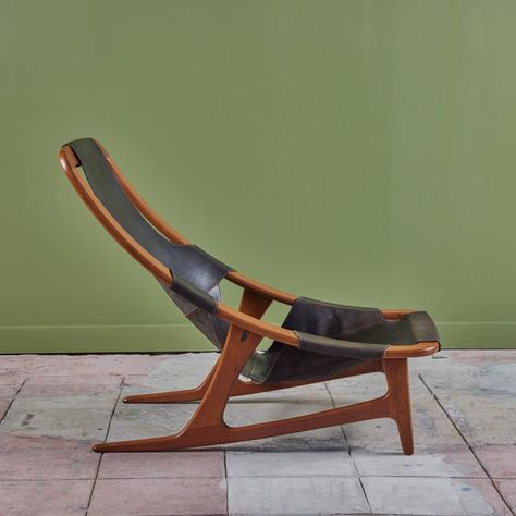 Designed in the 1950s by Arne Tidemand Ruud for Norwegian company Norcraft. The solid teak frame is wrapped with a black leather sling seat. The lounge chair is adjustable to recline to a slightly more relaxed position.  Dimensions 27.25" width x 39" depth x 20.5" height; 11" seat height.  Condition Excellent restored condition; frame has been professionally refinished with original leather. Mid Century Modern Rocking Chair, Leather Sling Chair, Wood Lounge Chair, Wood Chair Design, Chair Design Wooden, Danish Chair, Mcm Furniture, Innovative Furniture, Flat Pack Furniture