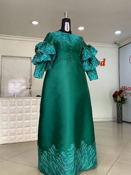 Garbadin fabric is the perfect one on this dress. Visit for more and don't forget to follow Female Kaftan Styles Nigeria, Material Gown Styles For Ladies, Mikado Styles, Latest Material Gown Styles, Material Gown, Aline Gown, Corporate Wears, Gown Styles For Ladies, Sewing Styles