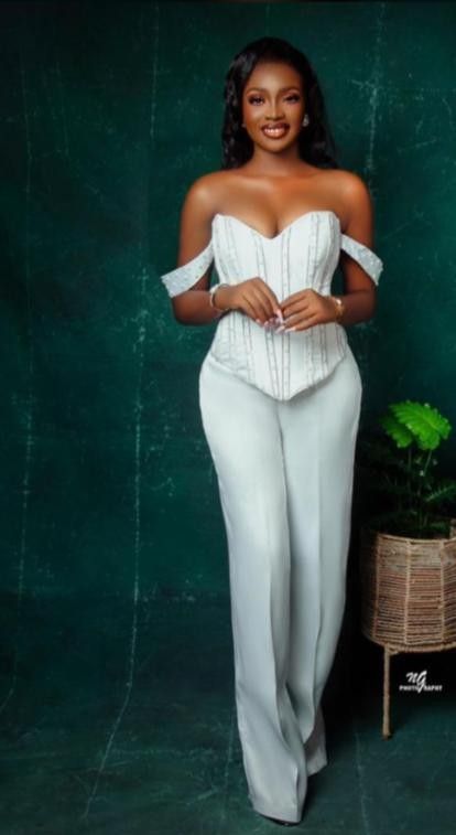 White Pants And Corset Outfit, 2 Piece Graduation Outfit, White 2 Piece Outfit Pants, Kente Suits For Women, Two Piece Wedding Guest Dress, Corset Two Piece Outfit, Corset Jumpsuit Outfit, Kente Dress Styles For Graduation Classy, Classy Jumpsuit Outfits Chic