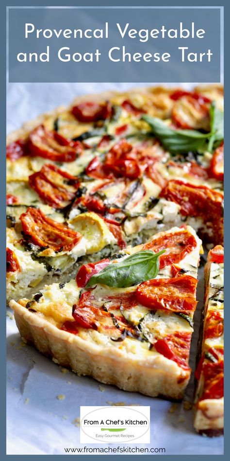 Provencal Vegetable and Goat Cheese Tart garnished with fresh basil with two pieces cut. French Summer Recipes, Quiche Goat Cheese, French Tart Recipes, Mediterranean Tart, French Vegetarian, Vegetable Tarts, Vegetable Tart Recipes, Vegetarian Tart, Savoury Tart