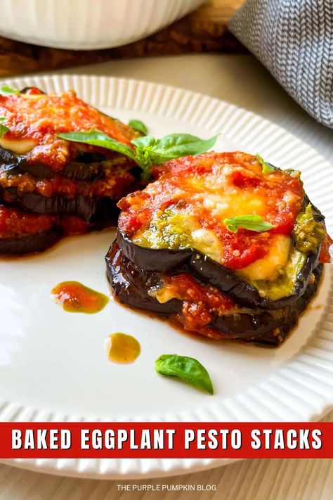 Impress your guests with these Elegant and Easy Baked Eggplant Pesto Stacks. Sliced eggplant, layered with marinara sauce, aromatic basil pesto, and a golden blanket of melted mozzarella cheese, create a visually stunning and deliciously satisfying dish. Perfect for a dinner party or a cozy evening at home. Discover the recipe on The Purple Pumpkin Blog. #ElegantEggplantStacks #PestoDelight #DinnerPartyFood Pesto Eggplant, Eggplant Pesto, Eggplant Stacks, Eggplant Parmesan Recipe, Eggplant Recipes Parmesan, Roasted Eggplant, Purple Pumpkin, Baked Eggplant, Classic Italian Dishes