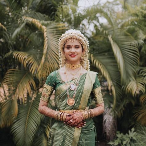 How pretty does she look in the traditional Konkani attire! Nothing can make a woman look beautiful like the glow of happiness on her wedding day.

Bride : @_am_gram22
MUA : @anushagkamath @kamathmamatha
PC : @prasadimages.weddings Konkani Bride, Konkani Wedding, Wedding Day Bride, Wedding Consultant, Indian Flowers, Beauty Academy, Wedding Store, Simple Mehndi, Bridal Portrait