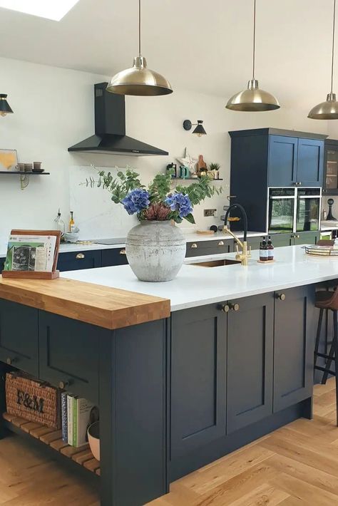 In need of blue kitchen inspiration or shaker kitchen inspiration? @home_at_51's Chilcomb Navy Kitchen is perfect for your blue kitchen ideas and traditional kitchen ideas. The white quartz worktop, solid oak worktop block and aged brass hardware are perfect for creating a traditional kitchen design. Add your favourite home decor, a black and brass kitchen tap and oak herringbone flooring to create a rustic kitchen design with a modern kitchen design twist. Blue Kitchen Interior, Blue Shaker Kitchen, Kitchen Diner Extension, Open Plan Kitchen Dining Living, Navy Kitchen, Open Plan Kitchen Diner, Kitchen Decor Inspiration, Open Plan Kitchen Dining, Fortnum Mason