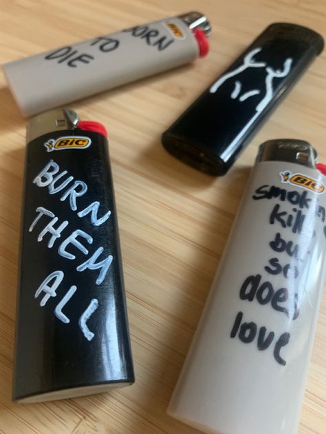 writing on lighters Gas Lighter Quotes, Hand Painted Lighters, Drawing On Lighter, Cool Lighter Designs, Funny Lighters, Lighters Design, Cool Lighter Aesthetic, Decorated Lighters Diy, Painted Lighter Aesthetic