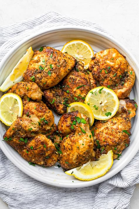 The secret to making the juiciest Boneless Chicken Thighs in the air fryer is marinating them with yogurt. They come out delicious! #airfryer #chickenthighs #bonelesschickenthighs #dinner #highprotein #easyrecipes #weightwatchers Air Fryer Boneless Chicken Thighs, Air Fryer Recipes Chicken Thighs, Chicken Thigh Marinade, Easy Air Fryer Chicken, Balanced Dinner Ideas, Chicken Thighs Dinner, Healthy Chicken Thigh Recipes, Weight Watcher Points, Yogurt Marinated Chicken