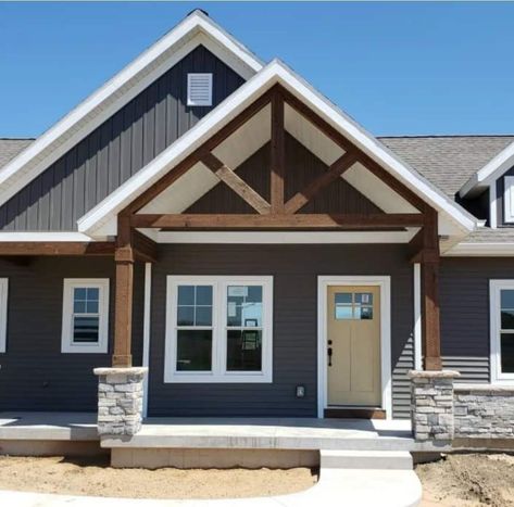 Tan House With White Windows, Black Roof Blue House, Gray Siding House Exterior, Bat And Board Siding Exterior, Dark Grey Siding White Trim, Black House White Windows, House Exterior Colors Schemes Grey, Grey Board And Batten Exterior, Blue Board And Batten Exterior