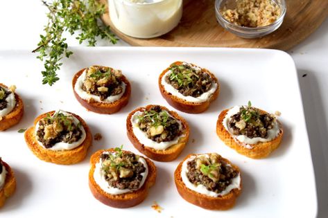 Author: Sheenam These bite sized delights can be served as the perfect appetiser for your next get-together. Make these delicious crostini using just a handful of ingredients and this snack is ready in minutes!! Crispy toasted golden brown bread topped with soft goats cheese (-mixed with some honey) and further topped with olive tapenade, crushed...Read More Cheese Olives Appetizer, Tapenade Appetizer, Toasted Crostini, Christmas Appetizers Easy, Bread Toppings, Goat Cheese Appetizer, Goat Cheese Crostini, Crostini Appetizers, Healthy Yogurt