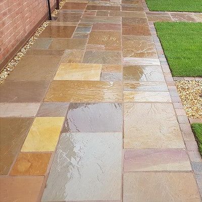 Rippon Buff Indian Sandstone Paving | Paving Slabs UK Sandstone Paving Slabs, Indian Sandstone, Tiles Uk, Sandstone Paving, Patio Slabs, Driveway Design, Contemporary Patio, Paving Slabs, Stone Cladding