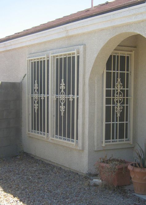 Wrought Iron Double Doors In Las Vegas • Artistic Iron Works Sectional Couch Living Room Layout, Sliding Grill, Wrought Iron Window Grill, Sectional Couch Living Room, Florida Hiking, Sliding Window Design, Windows Grill, Wrought Iron Security Doors, Window Guards