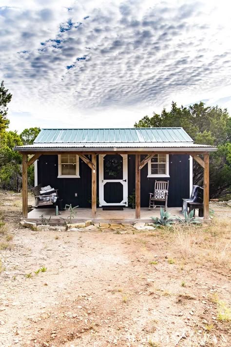 Black Shed With Wood Trim, Black Shed White Trim, Tiny Cabin With Porch, Tiny Home Backyard, Tiny House Porch, Simple House Exterior, Backyard Tiny House, Pavilion Ideas, Backyard Guest Houses